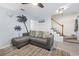 Living room featuring modern decor, ceiling fan, and staircase at 3008 Church St. # D3, Myrtle Beach, SC 29577