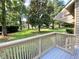 Enjoy tree lined views from your deck overlooking the expansive grassy backyard at 306 Westbury Ct. # 2-B, Myrtle Beach, SC 29572