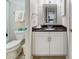 Well-maintained bathroom featuring a granite countertop and vanity, a toilet, and a shower at 306 Westbury Ct. # 2-B, Myrtle Beach, SC 29572