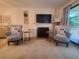 Inviting living room with fireplace, comfortable seating, and modern decor at 306 Westbury Ct. # 2-B, Myrtle Beach, SC 29572
