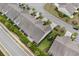 Aerial view of townhomes showcasing landscaping, patios, and community layout at 3334 Volterra Way # 3334, Myrtle Beach, SC 29579