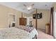 Spacious bedroom featuring natural light, vaulted ceiling, and warm color scheme at 3334 Volterra Way # 3334, Myrtle Beach, SC 29579