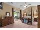 Bedroom with ample space, vaulted ceiling, and slider door to outdoor patio at 3334 Volterra Way # 3334, Myrtle Beach, SC 29579