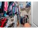 Well-organized walk-in closet with shelving and hanging space for clothing and storage at 3334 Volterra Way # 3334, Myrtle Beach, SC 29579