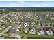 Aerial view of a neighborhood with multiple ponds, swimming pools, and well-kept landscaping at 347 Kessinger Dr., Surfside Beach, SC 29575