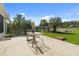 Inviting back patio overlooking a lush lawn and pond, ideal for outdoor dining and relaxation at 347 Kessinger Dr., Surfside Beach, SC 29575