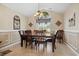 Spacious dining room featuring a chandelier and large windows for natural light at 347 Kessinger Dr., Surfside Beach, SC 29575