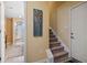 Welcoming hallway with stairs, leading to a bathroom area with an open shower at 347 Kessinger Dr., Surfside Beach, SC 29575