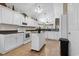 Spacious kitchen with white cabinets, an island, and modern appliances at 347 Kessinger Dr., Surfside Beach, SC 29575
