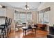 Inviting living room featuring bright windows, comfortable seating, and hardwood floors at 347 Kessinger Dr., Surfside Beach, SC 29575