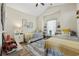 Bright bedroom featuring twin beds, a vaulted ceiling, decorative shelving, and wood-look flooring at 362 Shallow Cove Dr., Conway, SC 29527