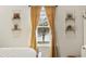 Bedroom with window view of the lake and decorative window treatments at 362 Shallow Cove Dr., Conway, SC 29527
