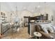 Open-concept kitchen with dark cabinets, stainless appliances, a breakfast bar, and a cozy living space at 362 Shallow Cove Dr., Conway, SC 29527