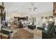 Open-concept living room adjacent to kitchen, with hardwood floors and neutral tones at 362 Shallow Cove Dr., Conway, SC 29527