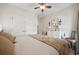 Bedroom featuring large double door closet, full size bed, and accent chair; wood look flooring at 362 Shallow Cove Dr., Conway, SC 29527