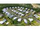 Aerial view of the Abaco Cove community showing lush landscaping, ponds and colorful houses at 374 Graytwig Circle, Murrells Inlet, SC 29576