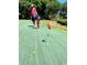 Fun putting green for Gathering recreation at 415 Ocean Creek Dr. # 2245, Myrtle Beach, SC 29572