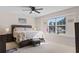 Comfortable bedroom with a king-sized bed, bedside tables, and a large window at 4171 Wrens Crossing, Little River, SC 29566
