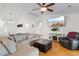 Comfortable living room with vaulted ceiling, hardwood floors, and entertainment area at 4171 Wrens Crossing, Little River, SC 29566