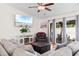 Spacious living room with hardwood floors, vaulted ceiling, and sliding door access to the patio at 4171 Wrens Crossing, Little River, SC 29566