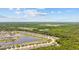 A scenic aerial view of homes in a community, with the property nestled amidst the natural beauty of a forest at 4359 Livorn Loop # 4359, Myrtle Beach, SC 29579