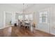 Dining area featuring a chandelier, hardwood floors and ample natural light at 4359 Livorn Loop # 4359, Myrtle Beach, SC 29579
