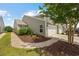 Side view of a well-maintained home with a lush lawn and inviting landscaping at 4359 Livorn Loop # 4359, Myrtle Beach, SC 29579