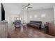 Spacious living room with hardwood floors, ceiling fan, and lots of natural light at 4359 Livorn Loop # 4359, Myrtle Beach, SC 29579
