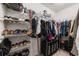 Organized walk-in closet featuring shelving for shoes and hanging rods for clothing storage at 4359 Livorn Loop # 4359, Myrtle Beach, SC 29579