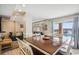 Open concept dining area with a view of the pool at 4501 S Ocean Blvd., North Myrtle Beach, SC 29582