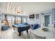 Charming game room with a pool table, dining area, and coastal decor at 4501 S Ocean Blvd., North Myrtle Beach, SC 29582