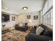 Relaxing living room with two sofas, neutral paint, and a mounted TV at 4501 S Ocean Blvd., North Myrtle Beach, SC 29582