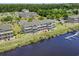 Waterfront condo building featuring private terraces and dock access at 4524 N Plantation Harbour Dr. # B3, Little River, SC 29566