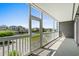 Covered balcony with a beautiful view of a canal and houses at 4524 N Plantation Harbour Dr. # B3, Little River, SC 29566