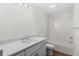 Bright bathroom features white vanity and shower over tub at 4524 N Plantation Harbour Dr. # B3, Little River, SC 29566