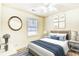 Comfortable bedroom with a queen bed, soft lighting, and tasteful decor at 4683 Wild Iris Dr. # 104, Myrtle Beach, SC 29577