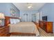 Spacious primary bedroom with a ceiling fan and ample space with natural light at 4812 Magnolia Lake Dr. # 102, Myrtle Beach, SC 29577
