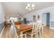 Open-concept dining area connected to the living room with stylish furnishings at 4812 Magnolia Lake Dr. # 102, Myrtle Beach, SC 29577