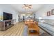 Open living room with a view into the dining area and kitchen at 4812 Magnolia Lake Dr. # 102, Myrtle Beach, SC 29577