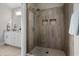 Walk-in shower with floor to ceiling tile and glass door at 4832 Williams Island Dr., Little River, SC 29566