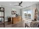 Office featuring dark wood floors, a large desk, a ceiling fan and water views at 4832 Williams Island Dr., Little River, SC 29566