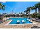 Sparkling pool with built-in loungers offering a relaxing view of the waterway and waterfront community at 4832 Williams Island Dr., Little River, SC 29566