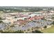 Aerial shot of a waterfront area featuring an amusement park, restaurants, and parking at 4879 Dahlia Ct. # 302, Myrtle Beach, SC 29577