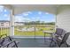 Scenic balcony overlooking a lush golf course and community pool, perfect for relaxation at 4879 Dahlia Ct. # 302, Myrtle Beach, SC 29577