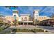 Commercial building with upscale architecture featuring shops and a movie theatre at 4879 Dahlia Ct. # 302, Myrtle Beach, SC 29577