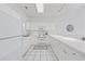 Well-lit kitchen featuring white cabinets, modern appliances, and ample counter space for cooking and entertaining at 4879 Dahlia Ct. # 302, Myrtle Beach, SC 29577