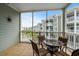 Relaxing screened-in balcony with outdoor seating to enjoy scenic views at 4895 Luster Leaf Circle # 304, Myrtle Beach, SC 29577
