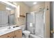 Well-lit bathroom with a glass-enclosed shower and vanity with sink at 4895 Luster Leaf Circle # 304, Myrtle Beach, SC 29577