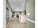 Welcoming entryway that flows into the main living area with light colored walls and a tile floor at 4895 Luster Leaf Circle # 304, Myrtle Beach, SC 29577