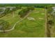 Picturesque golf course view with lush green fairways, mature trees and sand traps perfect for a challenging game at 4895 Luster Leaf Circle # 304, Myrtle Beach, SC 29577